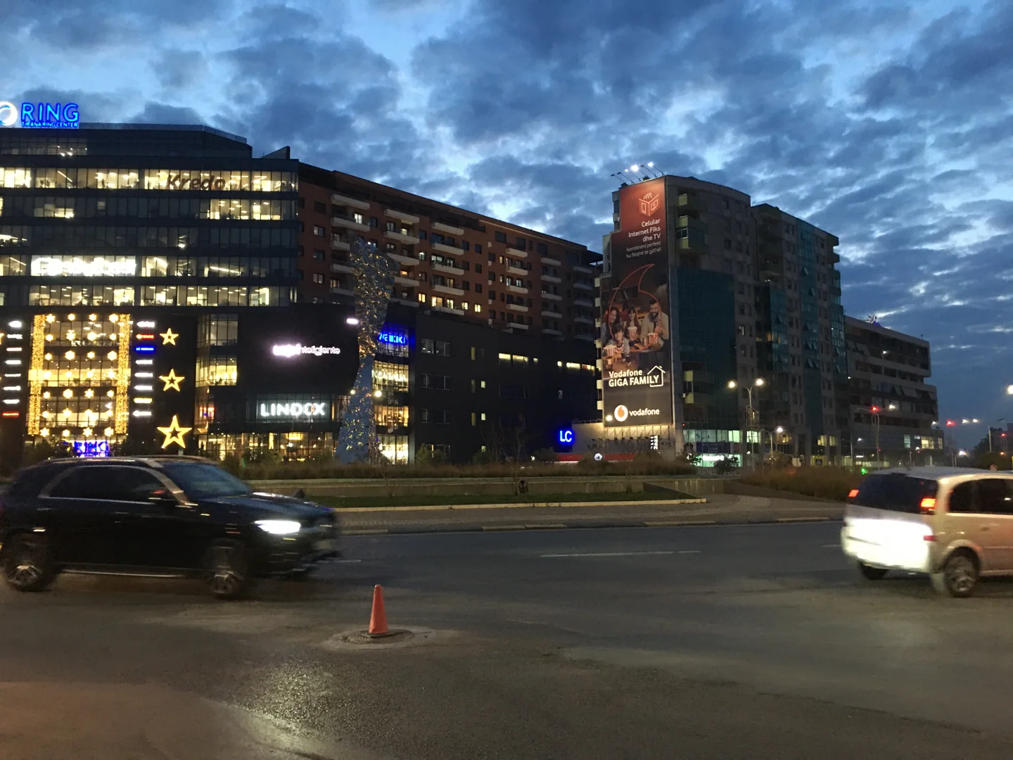Tirana city buildings around Zogu i Zi in the evening
