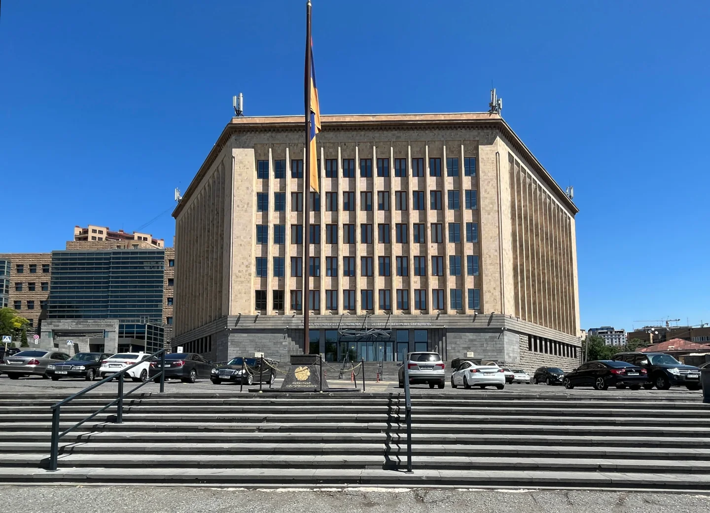 Steps leading to the American University of Armenia main building with its Armenian flag