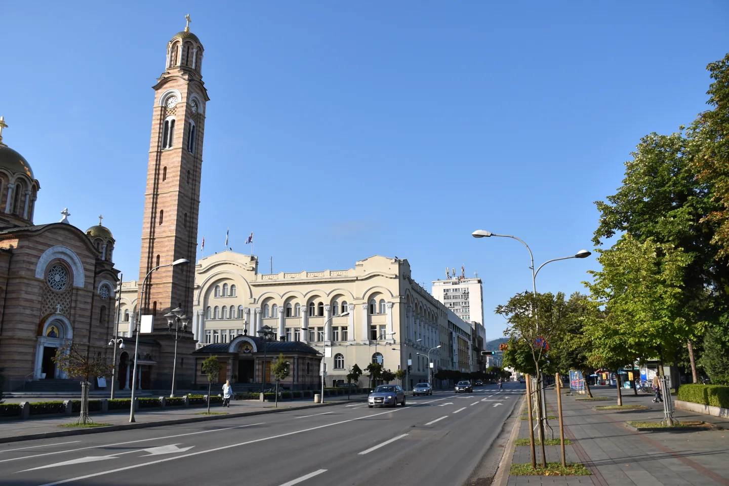 Buildings and daytime street activity on Kralja Petra I Karađorđevića Street in Banja Luka