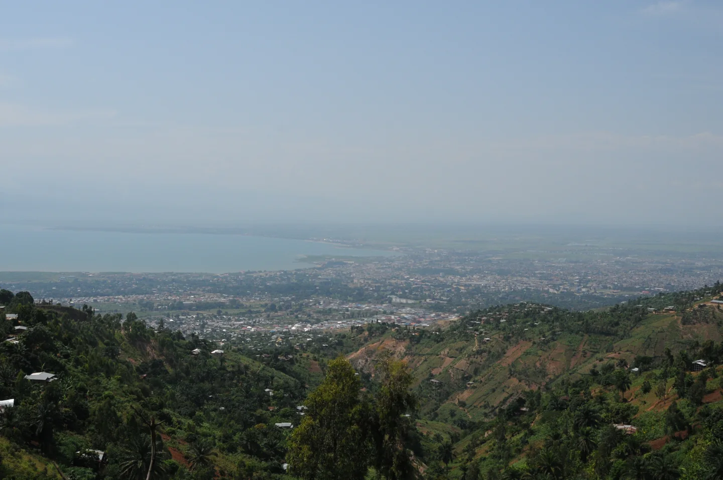 Bujumbura and Lake Tanganyika beyond buildings and cultivated hillsides