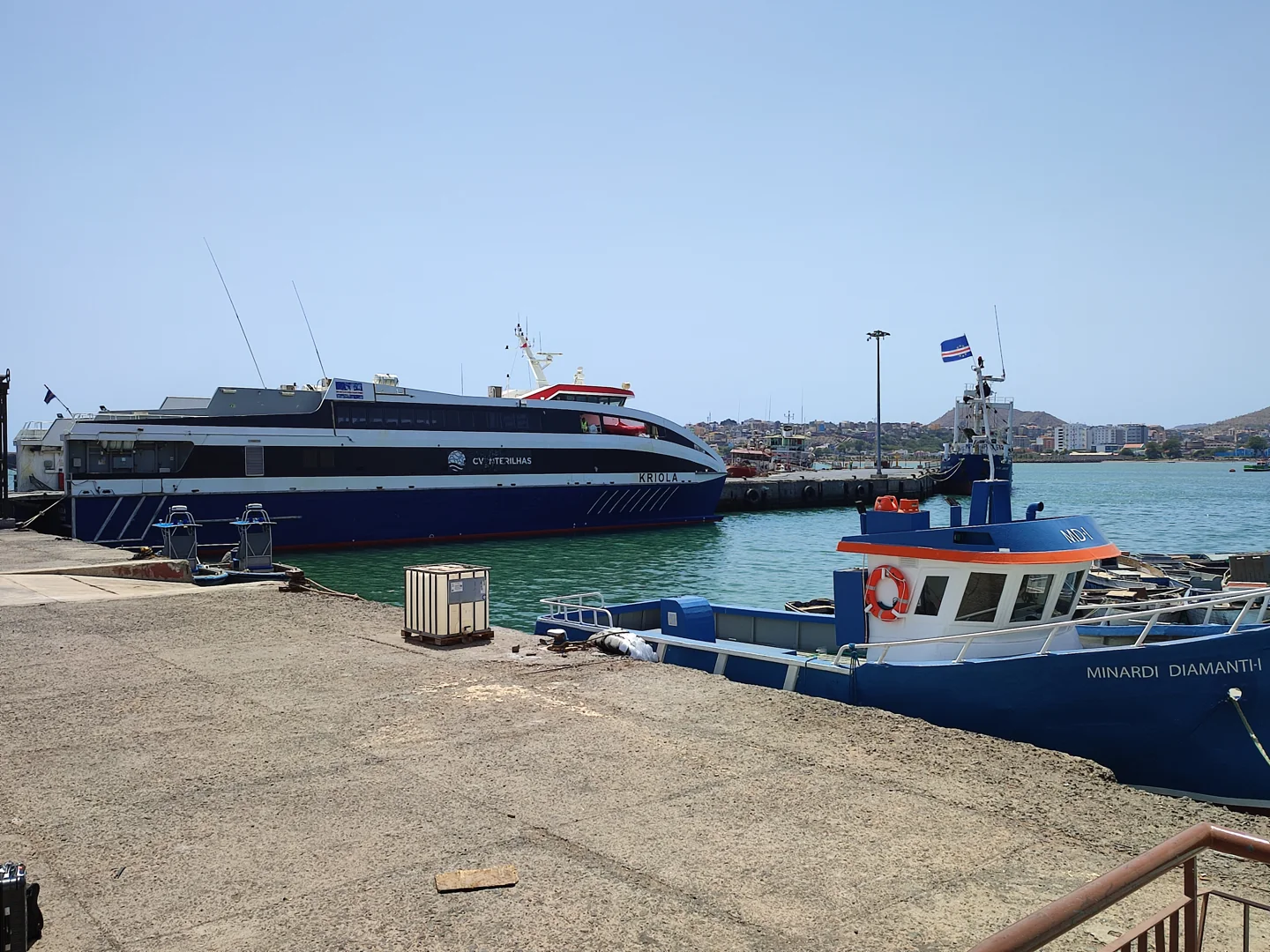 Vessels in Praia's port with the CV Interilhas ferry Kriola behind a foreground ship