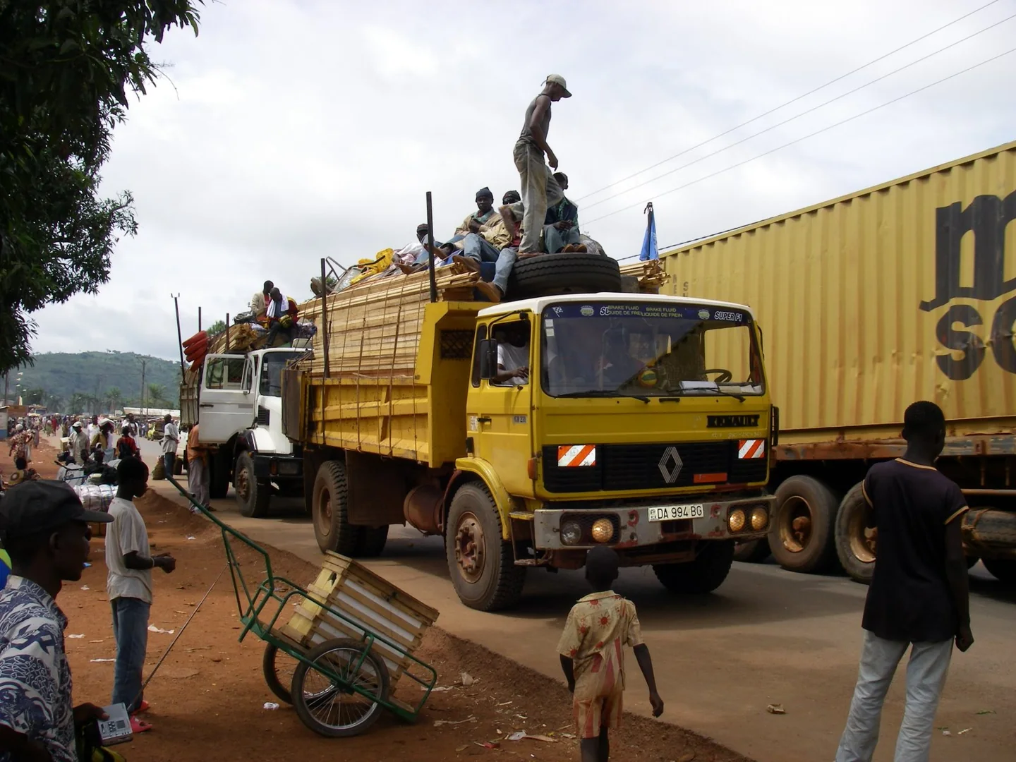 Trucks and vehicles in Bangui preparing for a journey