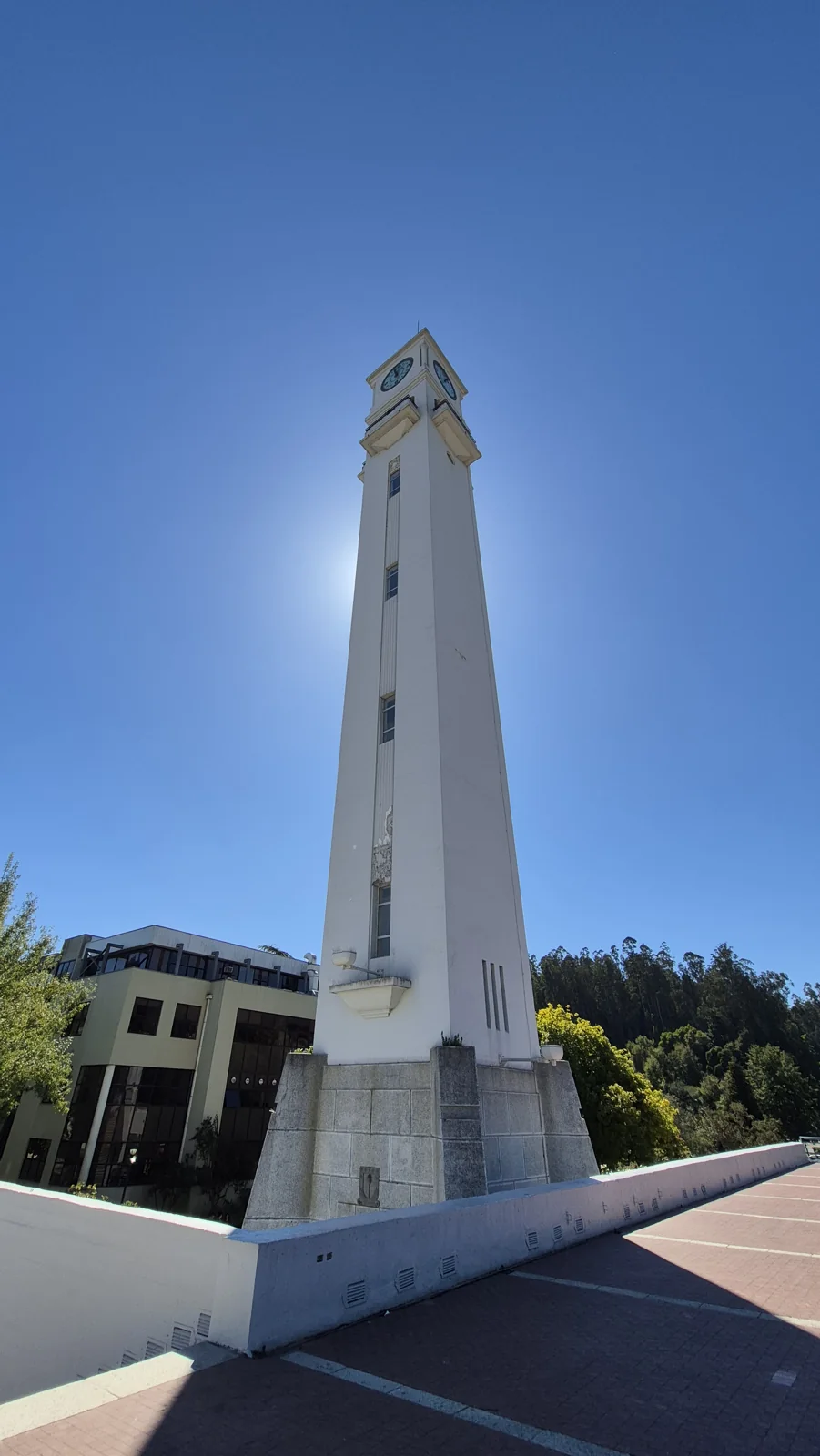 The Campanil tower, lawns and paths on Universidad de Concepción campus