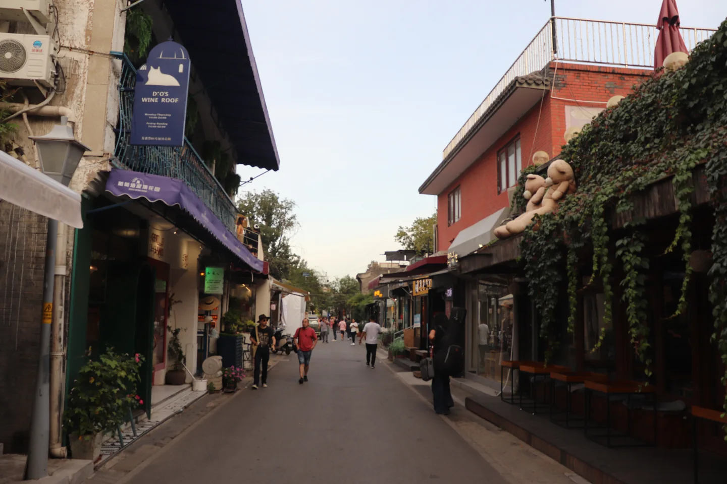 Buildings and pedestrians on Wudaoying Hutong in Beijing