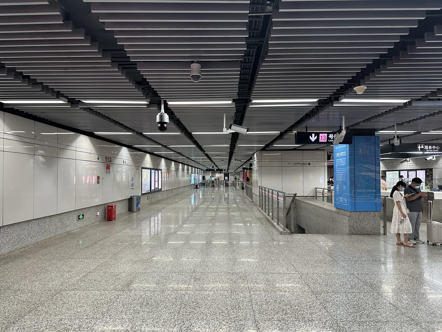Ticket gates and signs in World Expo Museum Metro station, Shanghai
