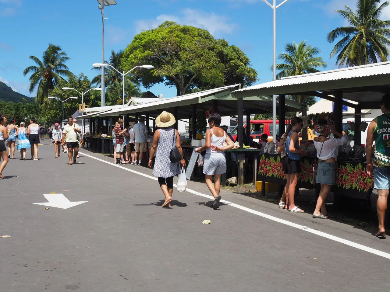 Stalls and people at Punanga Nui Market in Avarua