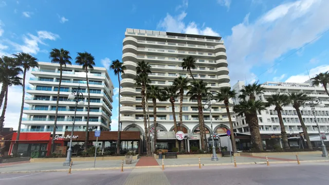 Palm trees and hotel façades along the Phinikoudes seafront road in Larnaca