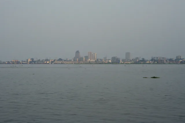 The Congo River in front of Kinshasa’s Gombe skyline, viewed from the opposite bank