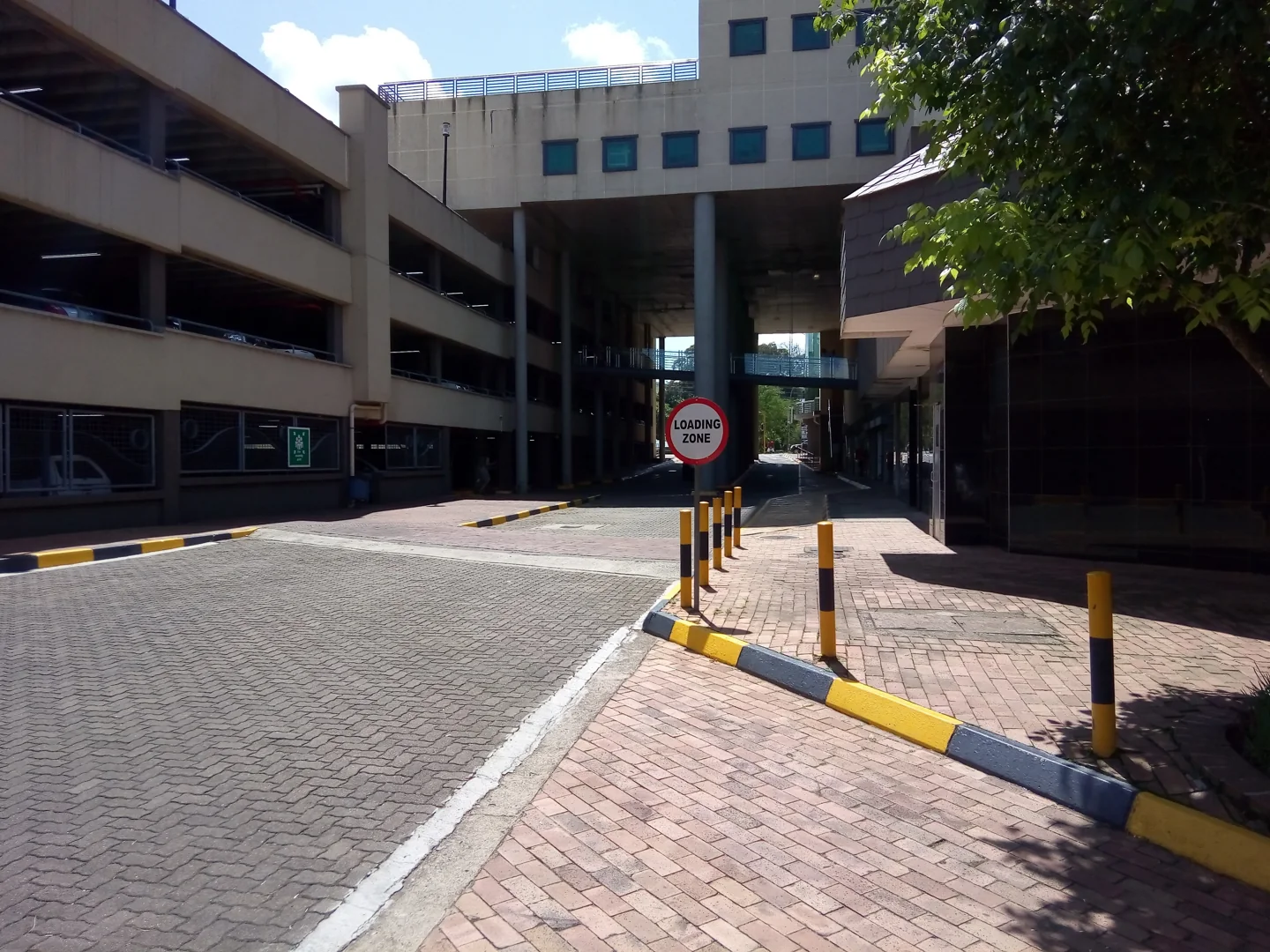 Buildings and pedestrian shopping space at Swazi Plaza in Mbabane
