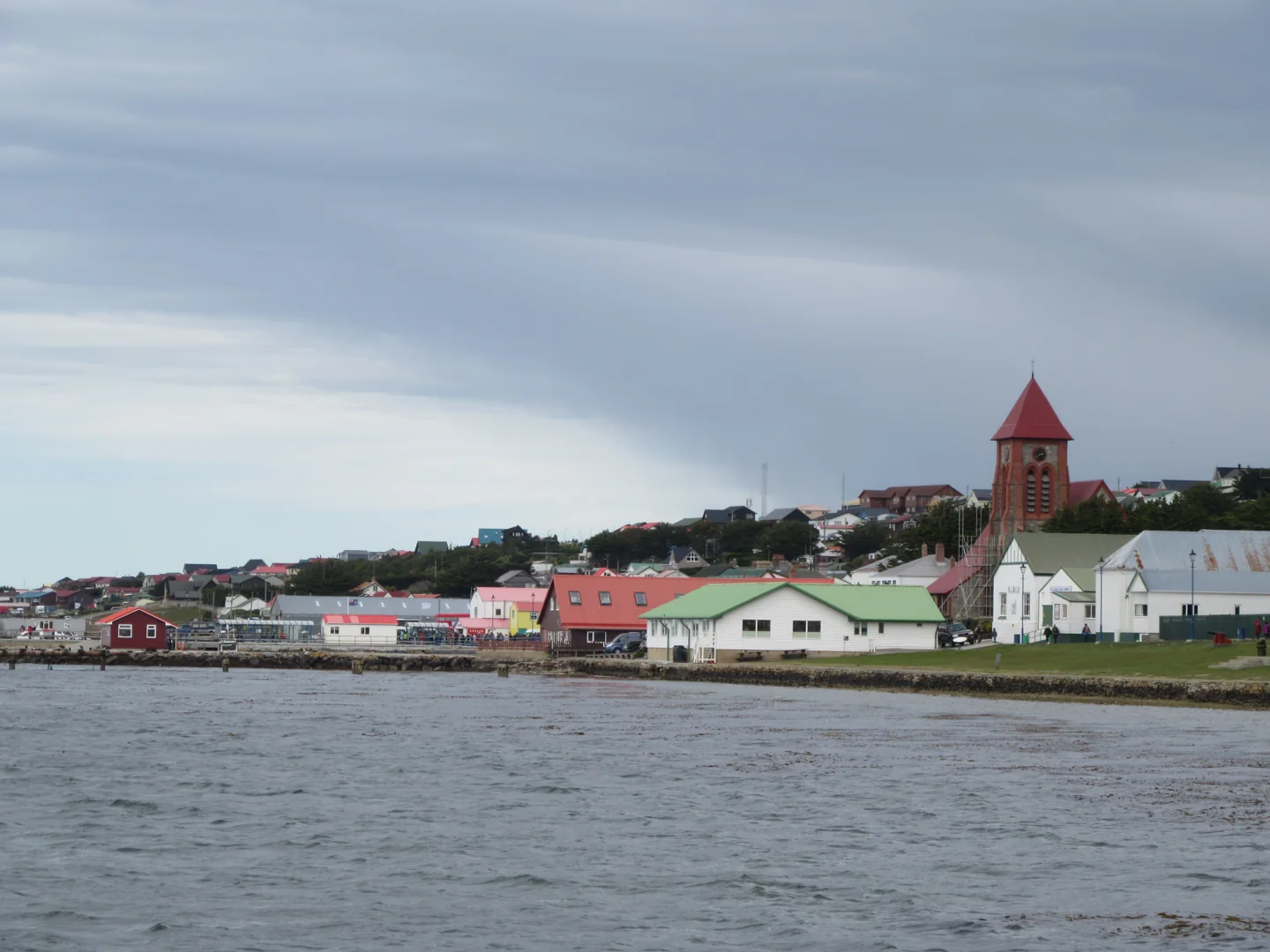 Stanley town and historic cathedral seen beside the harbour